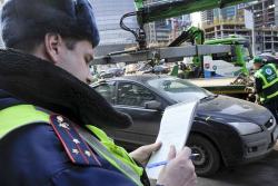 Фото эвакуации авто сотрудником ДПС