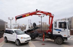 Фото эвакуатора с гидроманипулятором