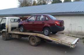 Фото эвакуатора с лебедкой и ломанной платформой